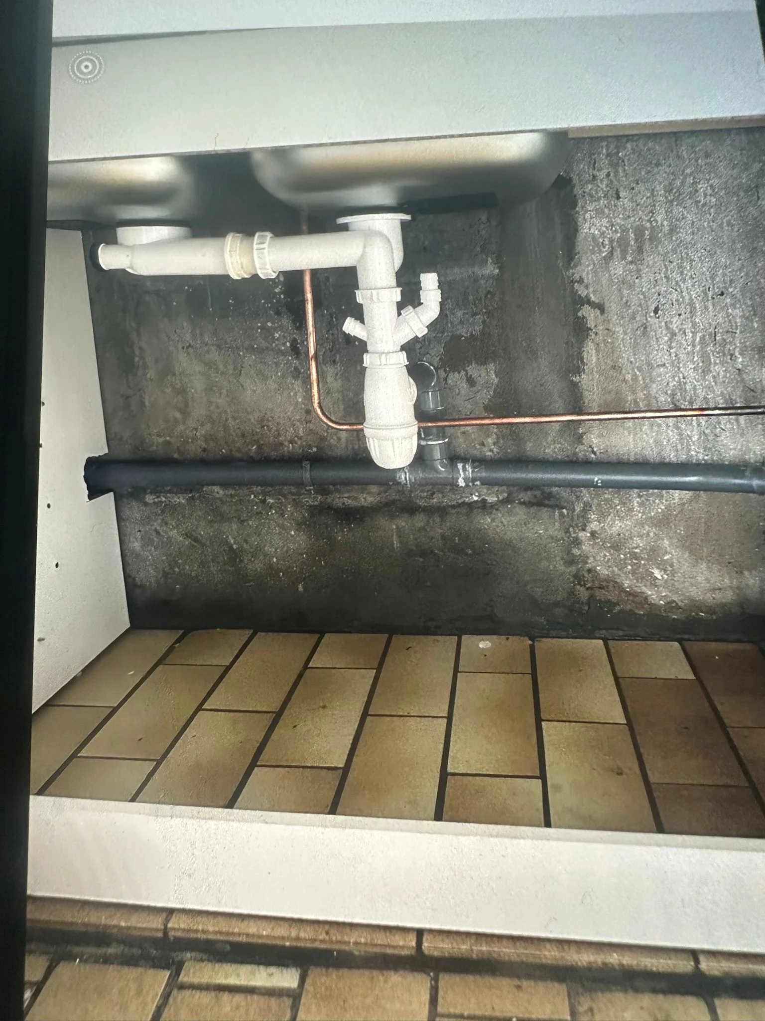 Évacuation sous évier double